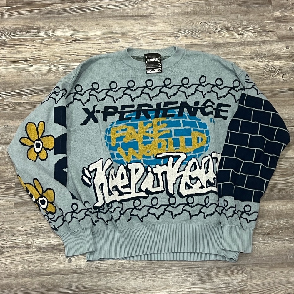 Perks and Mini (PAM) ‘Fake World, Keep it Real’ Sweater